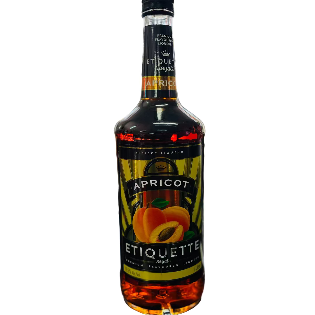 Bottle of Etiquette Apricot liqueur on a bar counter with a blurred bar background