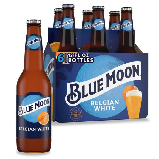 Six-pack of Blue Moon Belgian White beer bottles with packaging on a white background