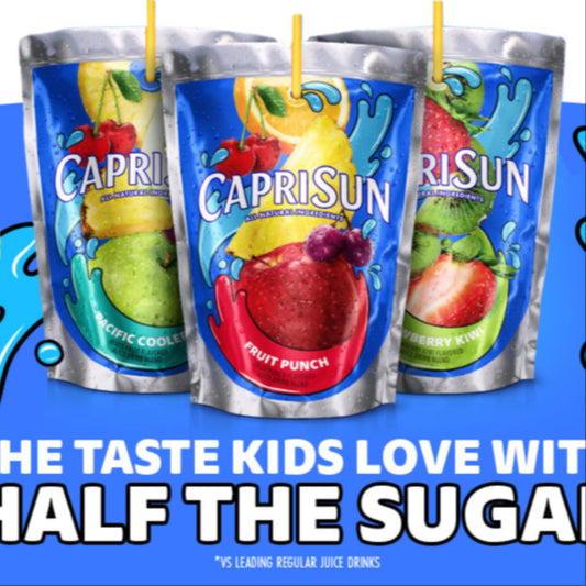 Three Capri Sun juice packs on a blue background with fruit graphics and text about sugar content.