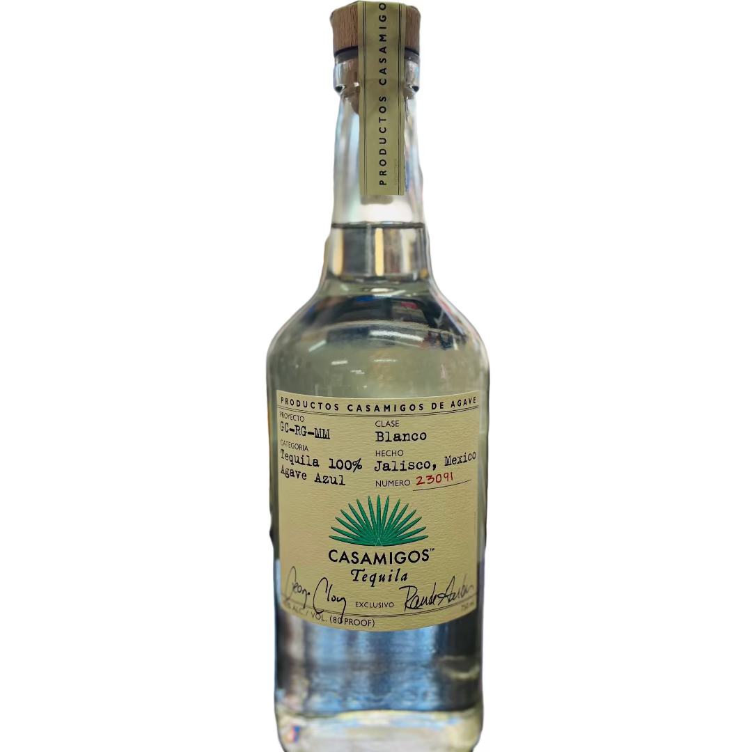 Bottle of Casanicos tequila on a bar counter with a blurred bar background