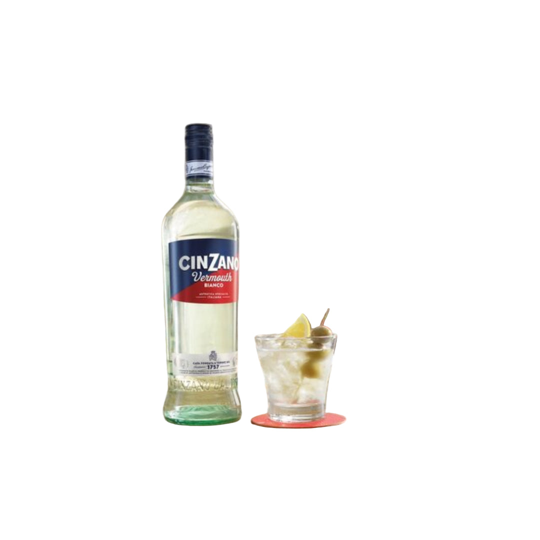 Cinzano vermouth bottle on a table with drinks in the background