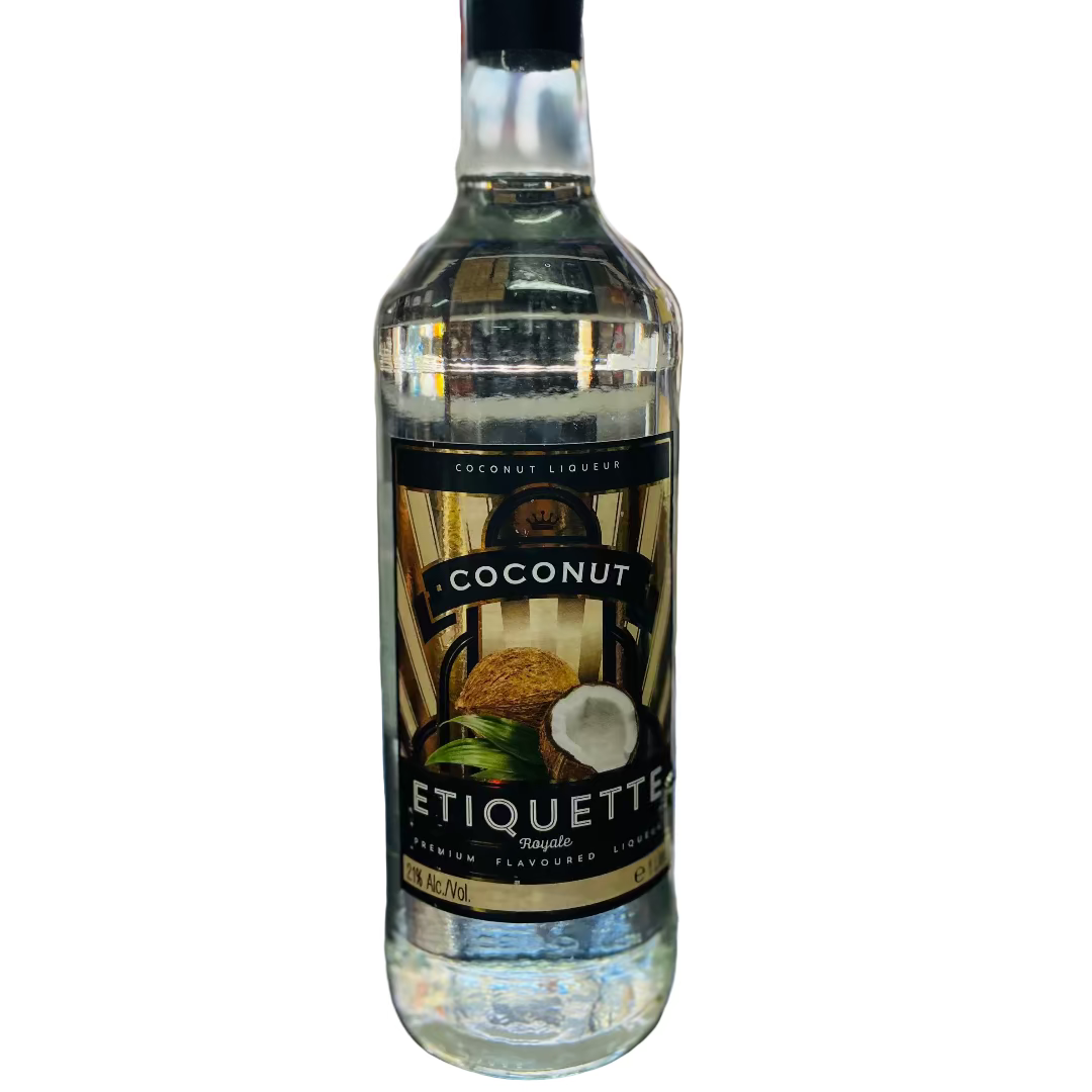 Bottle of Etiquette Coconut liqueur on a bar counter with a blurred bar background