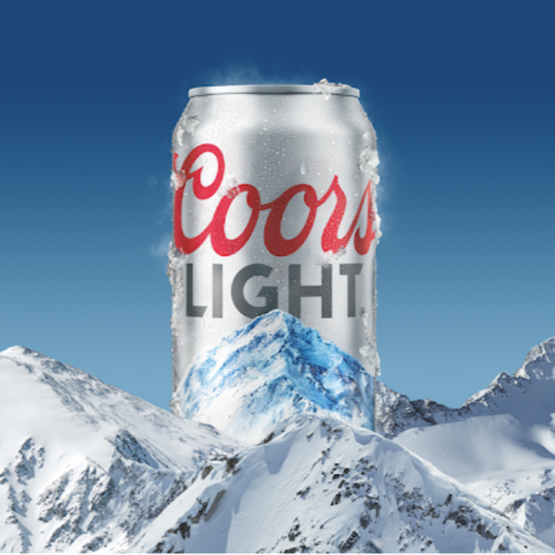 Coors Light beer can with snowy mountains in the background