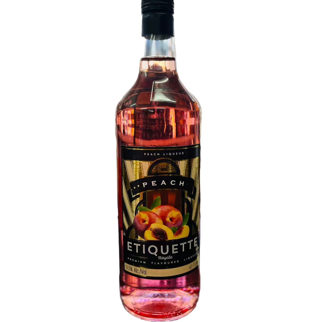 Bottle of Etiquette Peach Liqueur on a bar counter with a blurred bar background