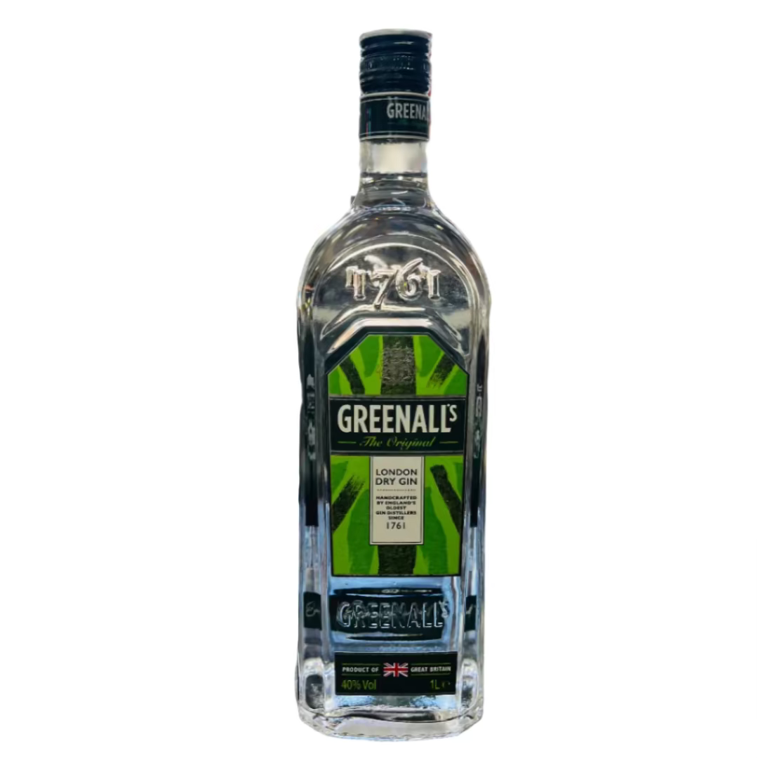 Greenall's gin bottle on a bar counter with a blurred bar background