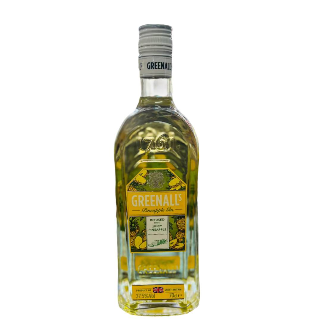 Bottle of Greenall's gin on a bar counter with a blurred bar background