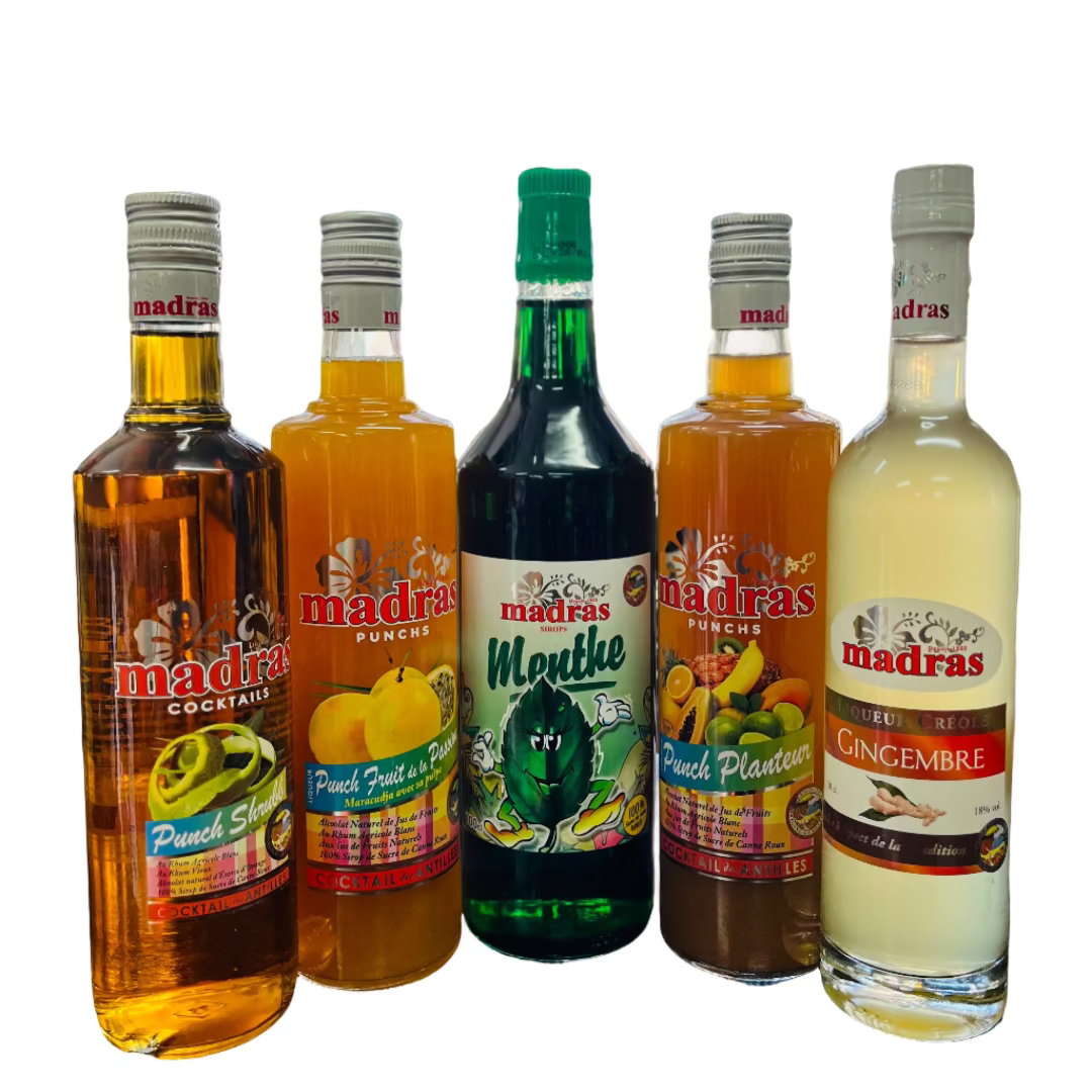 Five bottles of Madras brand alcoholic beverages on a bar counter with a blurred bar background.