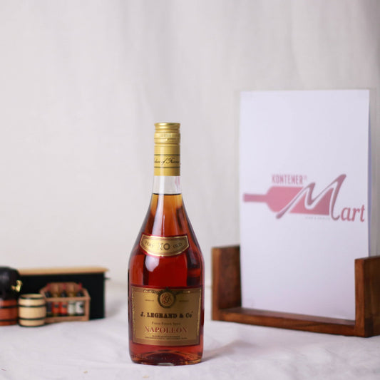 Bottle of J. Legrand & Co Napoleon brandy with a branded stand in the background.