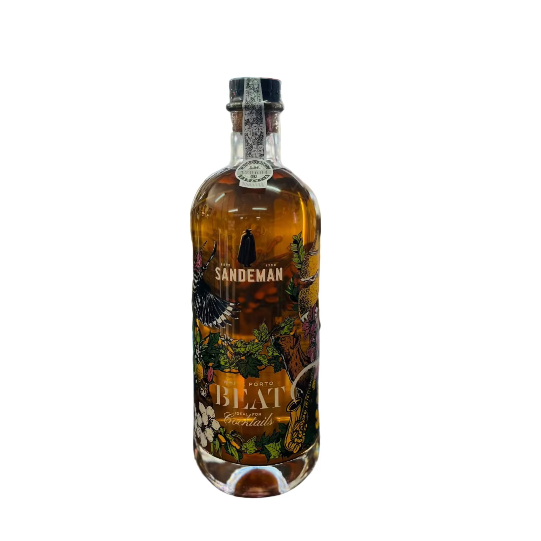 Bottle of Sandeman Beat rum on a bar counter with a blurred bar background