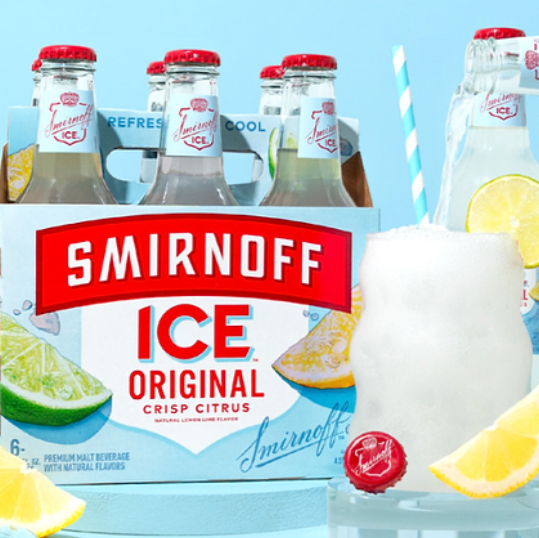 Smirnoff Ice bottles and packaging with lemon slices on a blue background