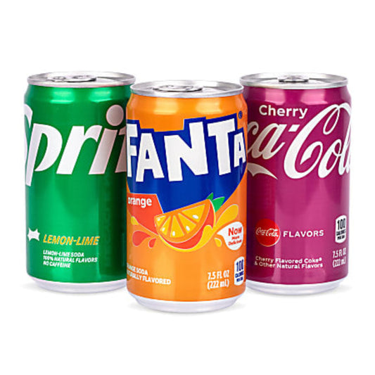 Three soda cans: Sprite, Fanta, and Cherry Coca-Cola on a white background